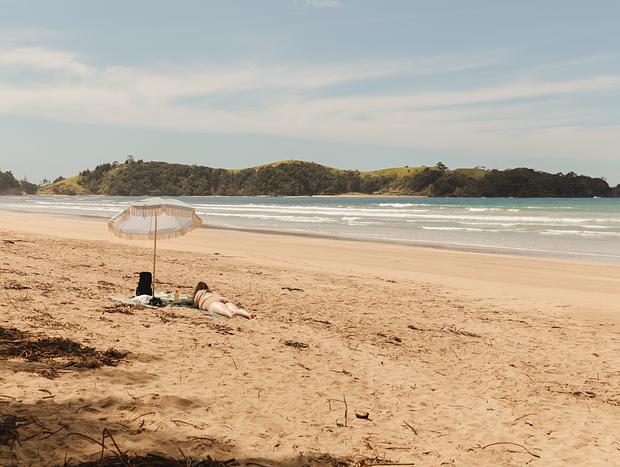 Relaxing at Whananaki Beach