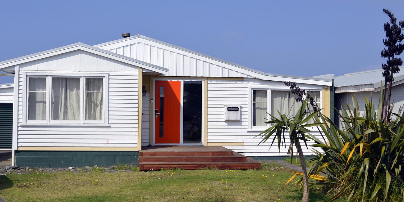 The Orange Door Bach House for Rent in Opunake, Taranaki, NZ Riparide