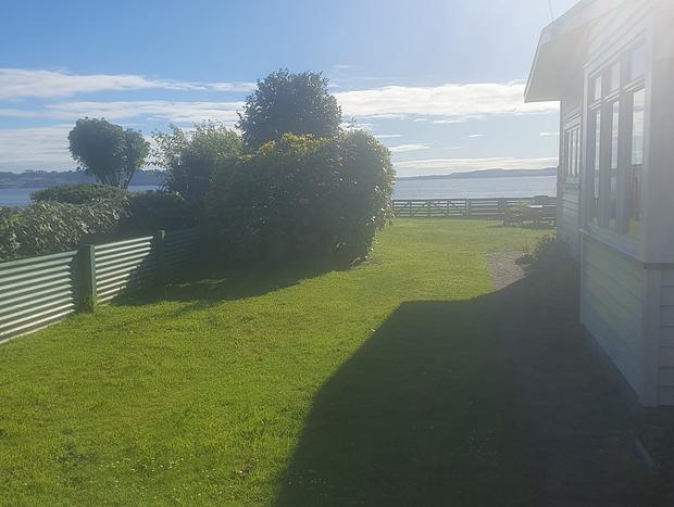 Photo 26 for Daydream House - sunrise & sunset views across lake