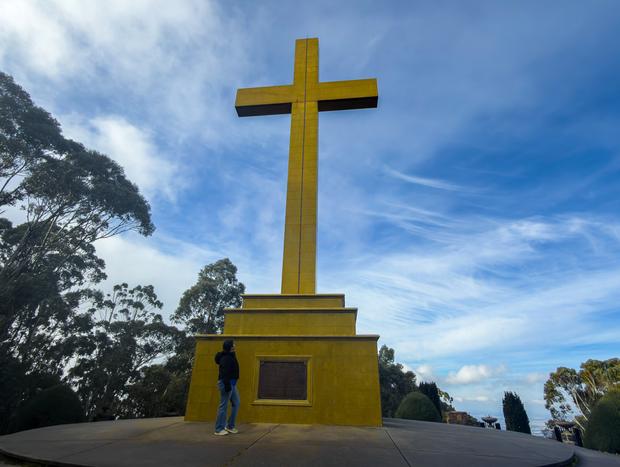 Photo 1 for Standing at the Memorial Cross